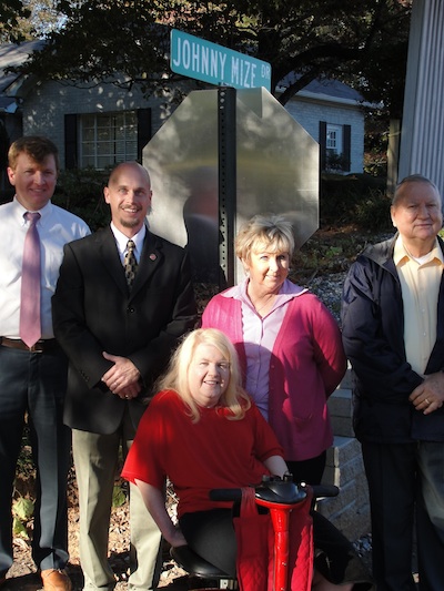 Johnny Mize's daughter, Judy (seated) joins Demorest city officials for a road naming ceremony honoring her legendary father.