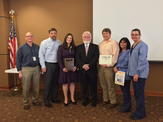 Representatives from Ethicon join Habersham County United Way Executive Director Billy Boyd, center, for a photo op after the annual meeting. Ethicon raised over $300,000 for United Way.