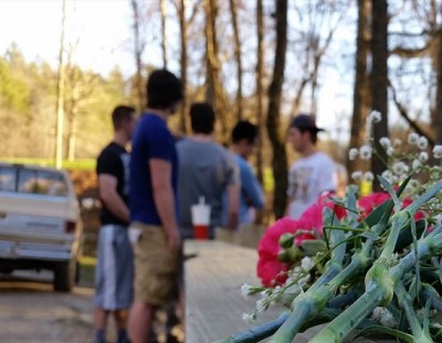 Now Habersham Gene Nix Road Crash friends gather flowers