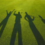 Friends, golf, and howling winds