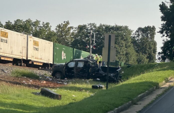 pickup truck hit by train in Lula
