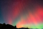 Northern lights paint the night sky