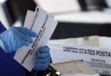 Fewer Georgians are planning to vote by mail, with one day left to request an absentee ballot