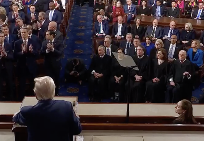 Chief Justice John Roberts looks on during President Donald Trump's speech before Congress on March 4, 2025