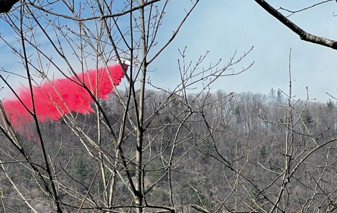 air tanker drops fire retardent on Big Ridge Fire