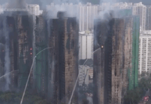 Hong Kong’s housing minister resigns after fire investigation finds inadequate oversight