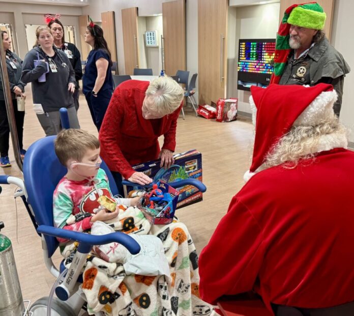 Wanda and Scott deliver toys