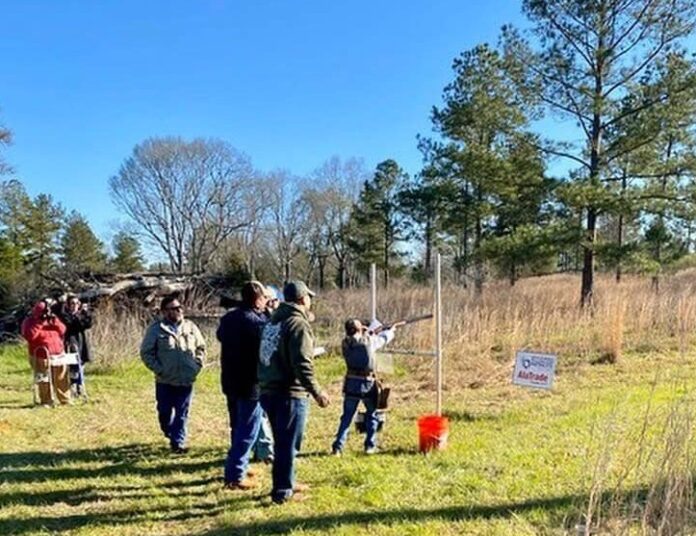 crowd with skeet shooter