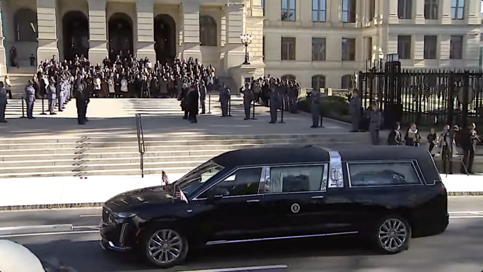 President Carter's hearse passes by the Georgia State Capitol