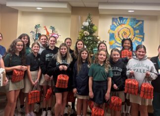 Tallulah Falls girls basketball team donates books to NICU