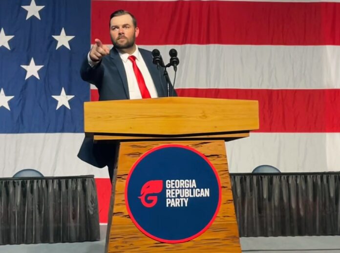 Chuck Hand at podium