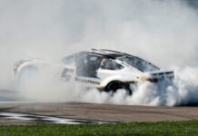 Tyler Reddick passes Kyle Larson on the final lap of OT to win NASCAR Cup Series race at Kansas