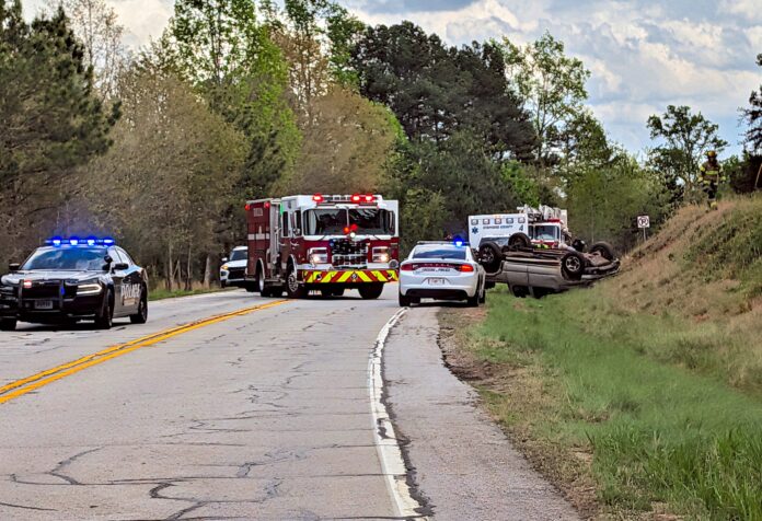 rollover wreck on Liberty Hill