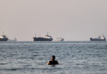 With Iran peace agreement to be signed Friday, Trump says ships moving in Strait of Hormuz