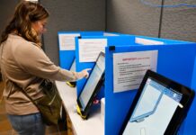 Georgia’s vote-counting method will soon be banned. Lawmakers will try to find a fix this week