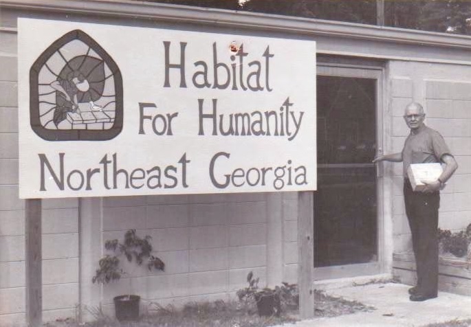 Father Pete at Habitat office