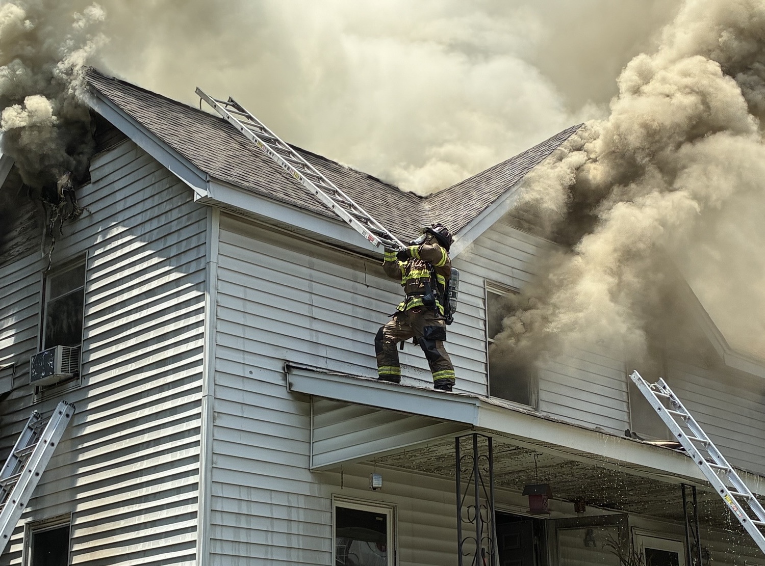 Firefighters rescue person trapped inside burning home in Hall County ...