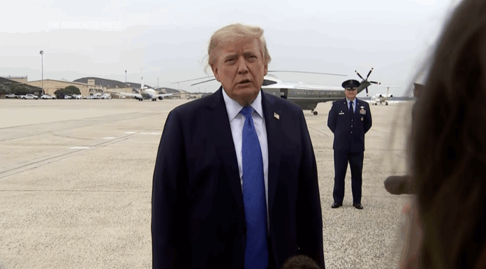 Trump talks with reporters about USS Lincoln