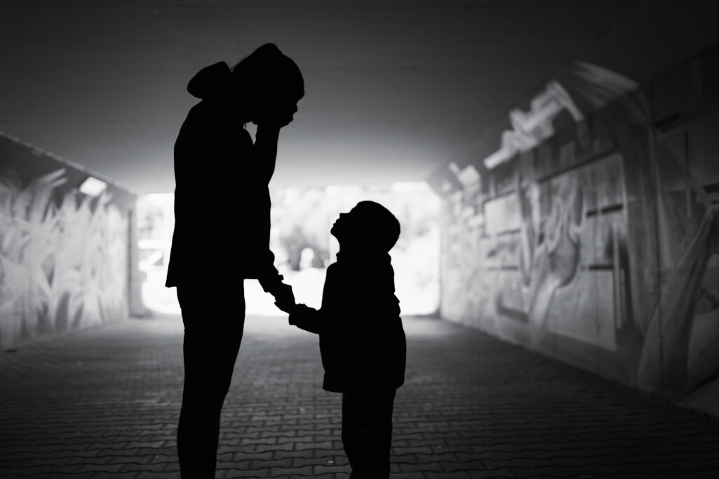People in the shadows