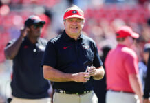 Georgia-Alabama showdown is on schedule despite arrival of Hurricane Isaias; Trump will skip game