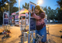 Israelis mourn Oct. 7 attack as Palestinians in Gaza languish in ruins of the war it sparked