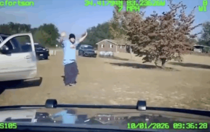 Colin Bryant surrendering to police after chase