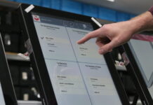 Election workers prepare for early voting as talk of DOJ ‘intervention’ leaves advocates unsettled